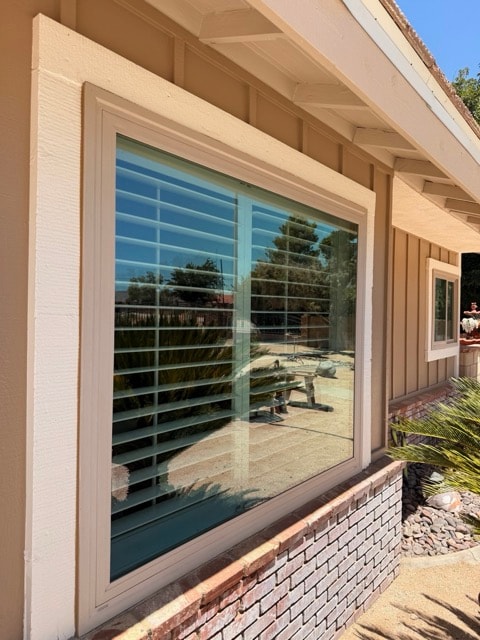 Large picture window cleaned on ranch-style home